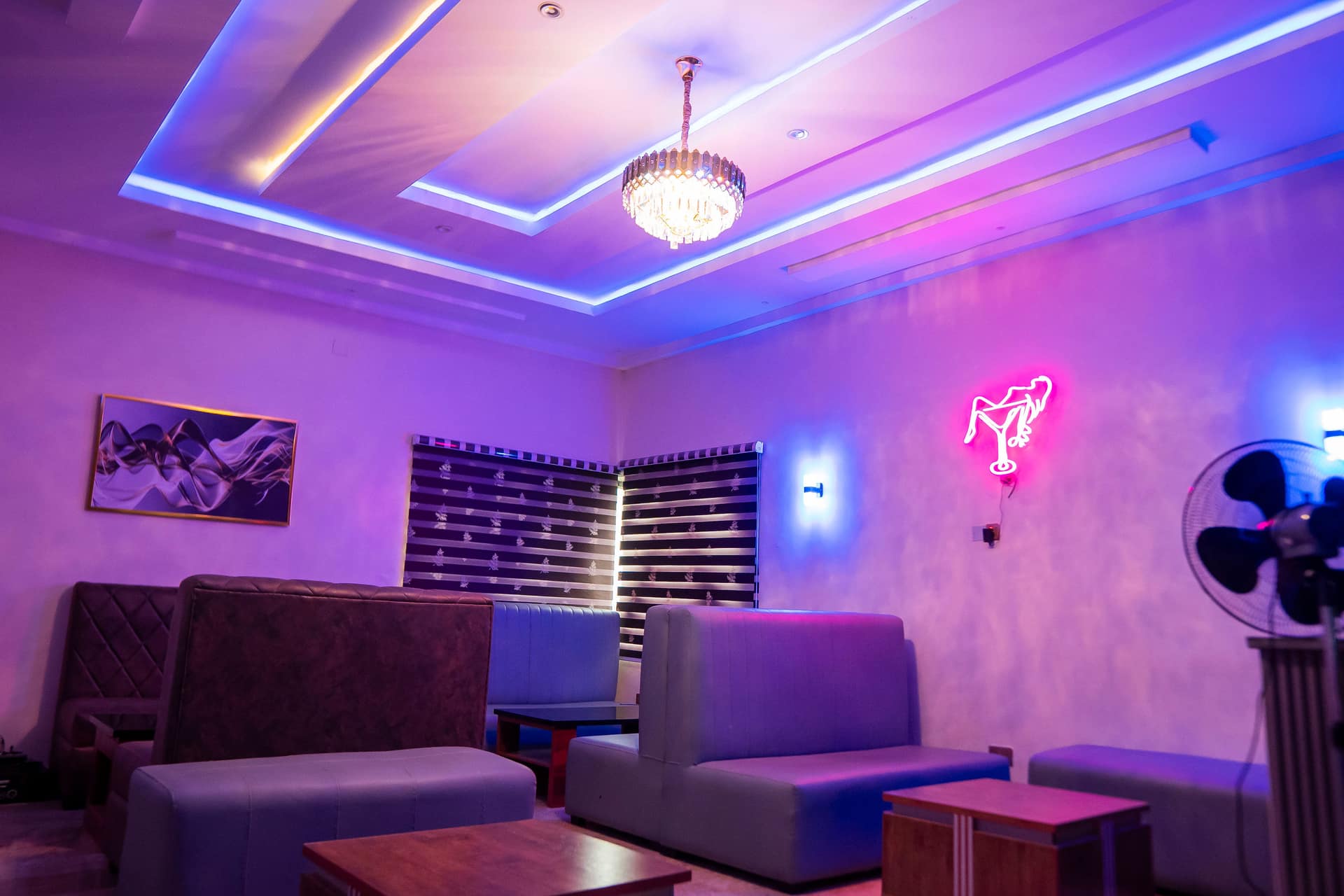 The Nice-Mason lounge with ambient lighting and plush seating