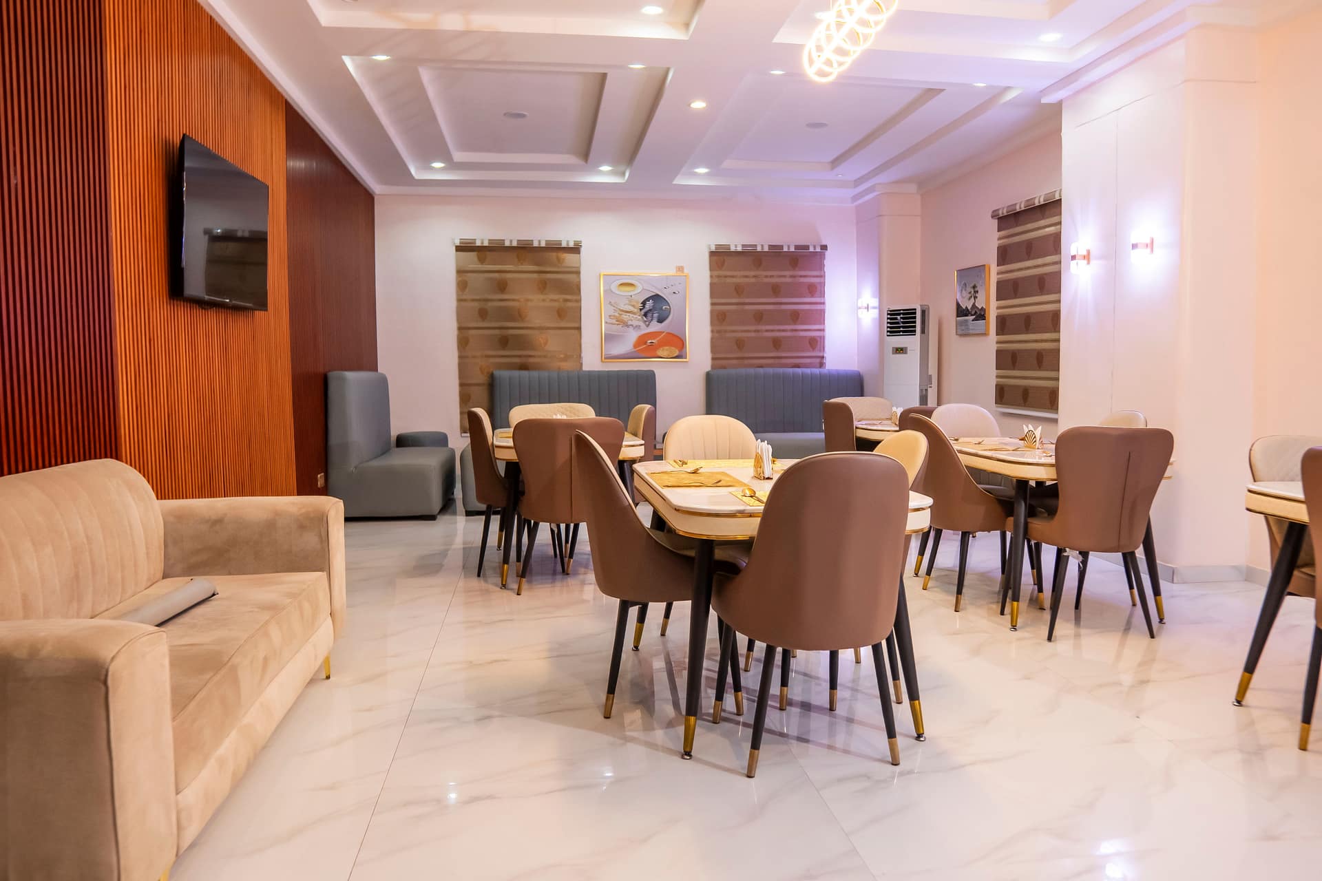 In-house restaurant with marble floors and elegant seating